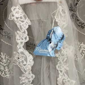 White lace fingertip length veil